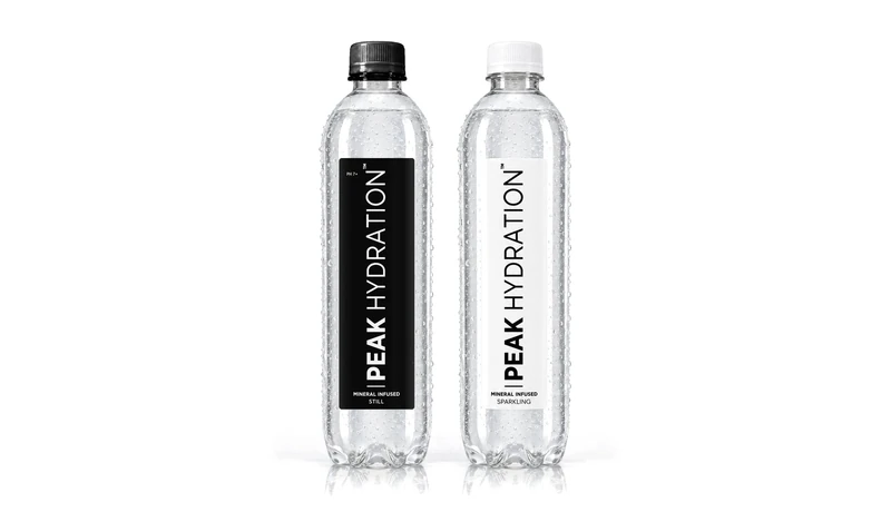 Peak Hydration mineral-infused still and sparkling water, 500 ml bottles side by side